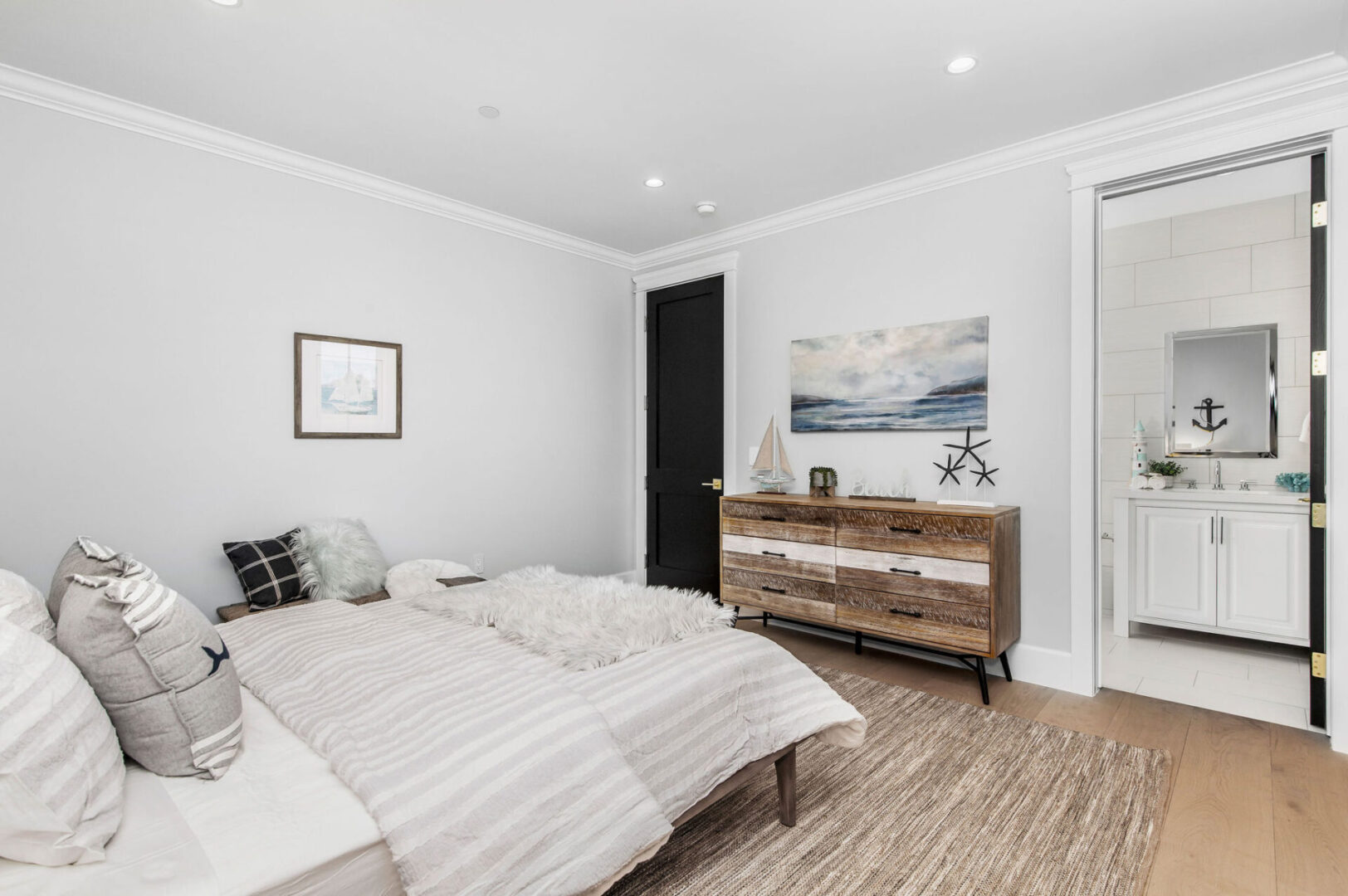 A Bedroom With White Color Bedsheets