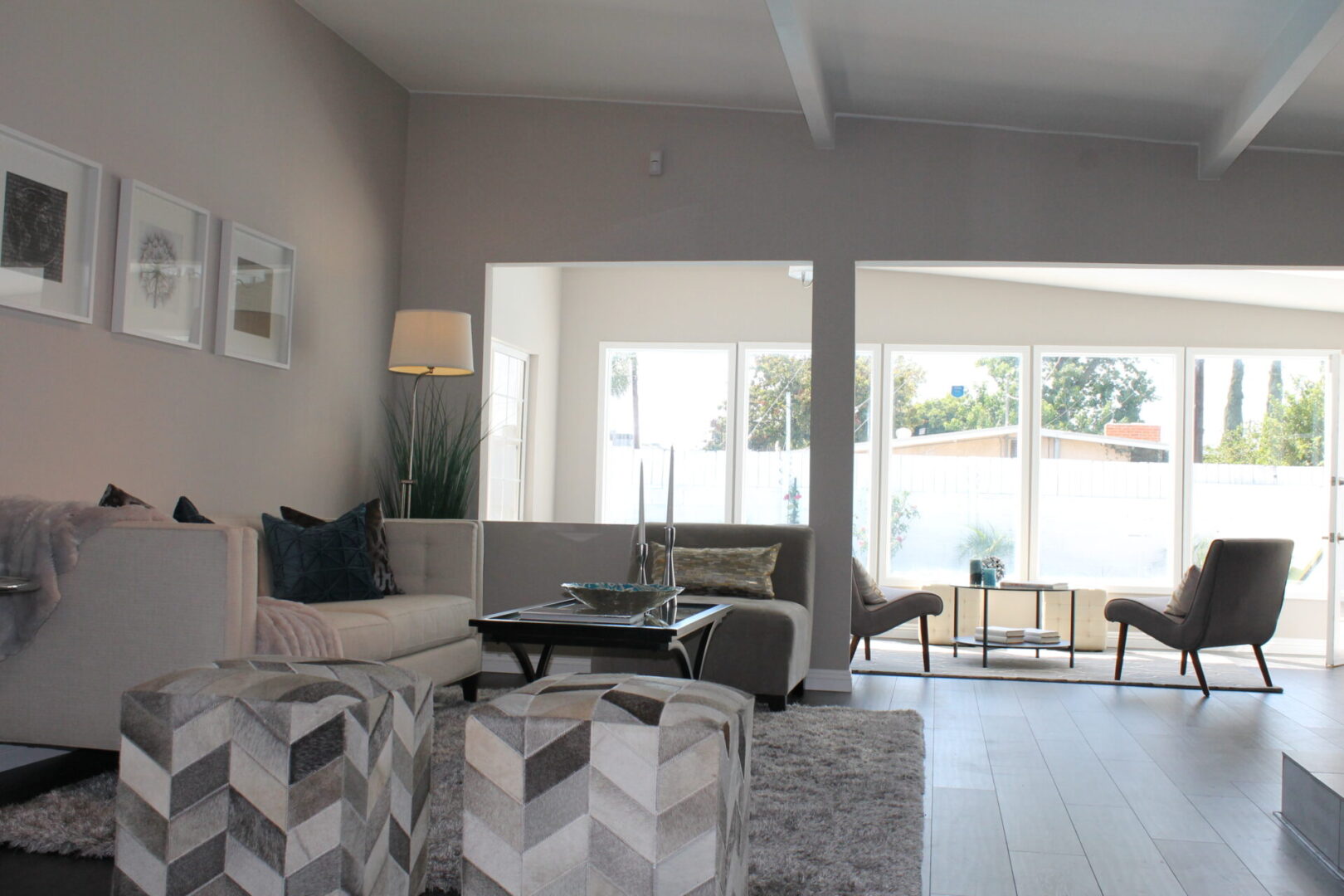 A Grey and White Color Couch in a Livingroom