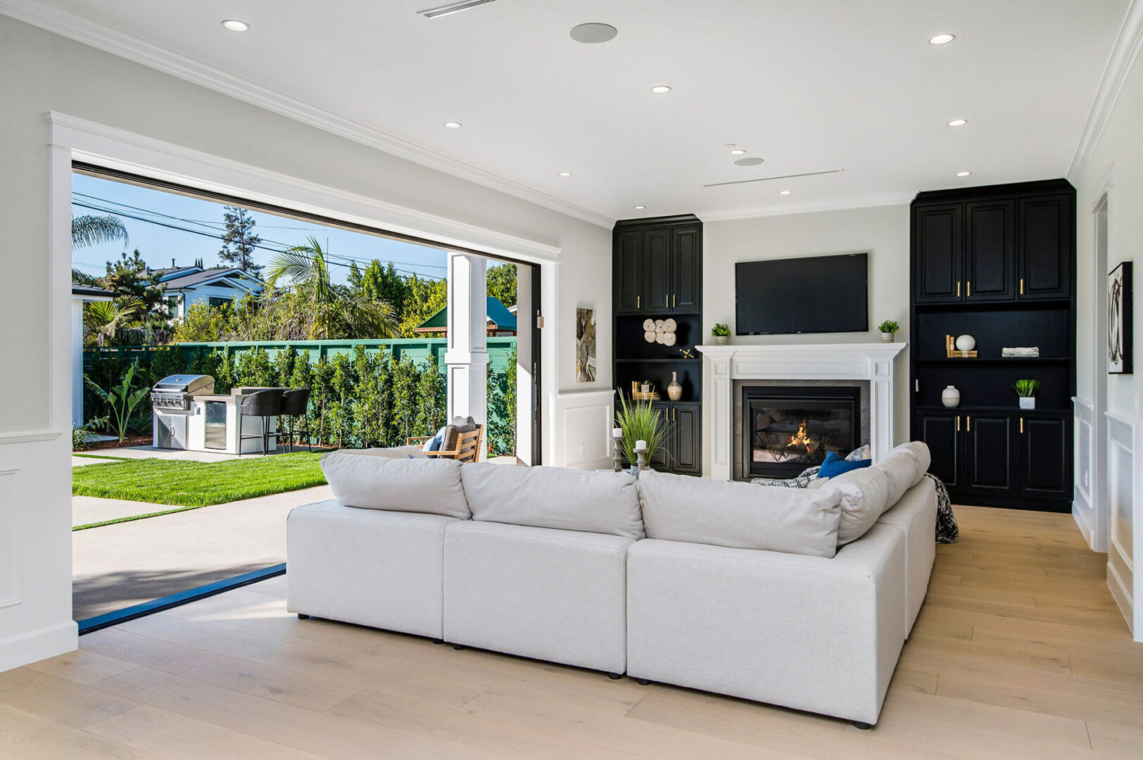 The Back of a Big White Couch in a Livingroom