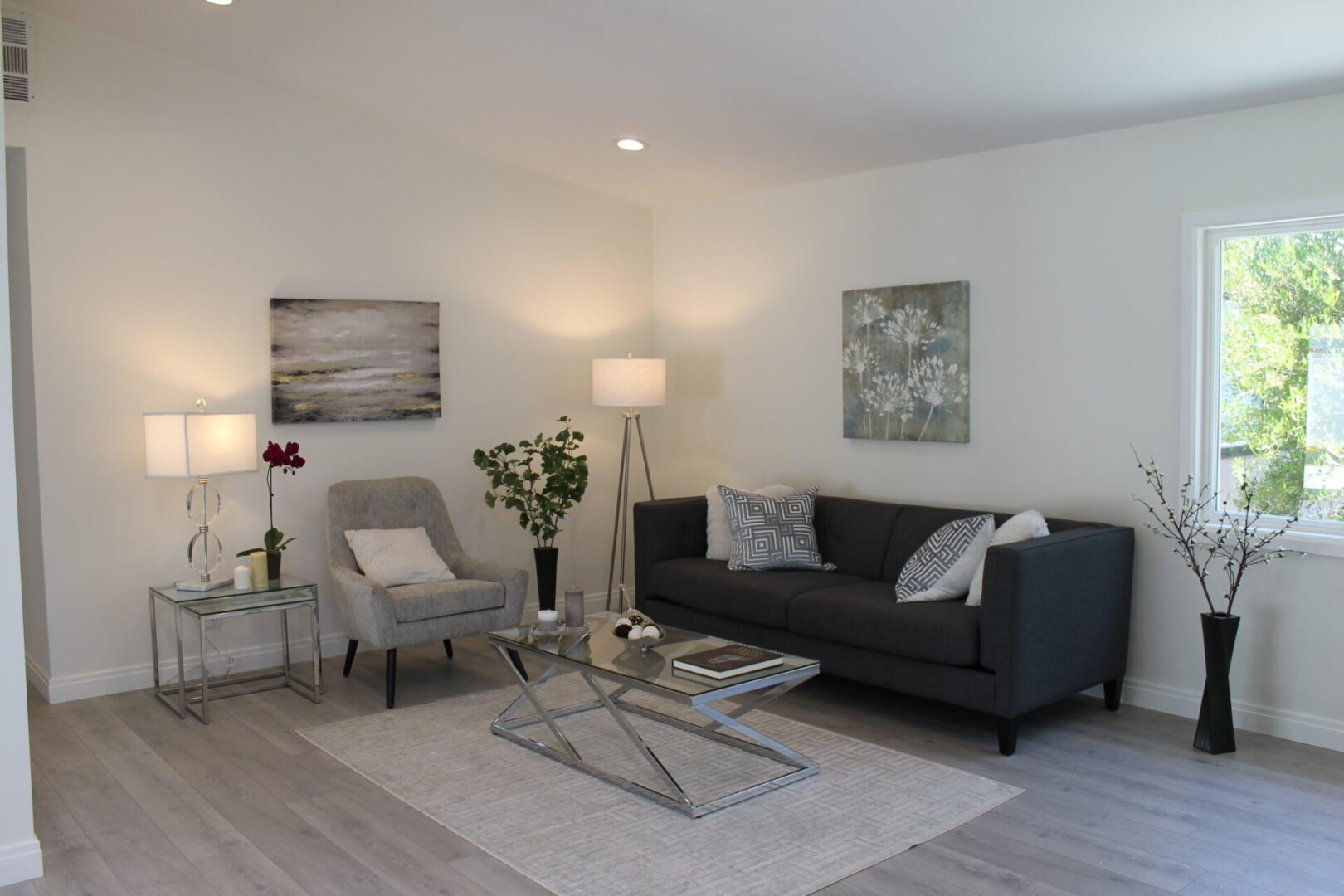 A Black and White Color Couch in a Living Room