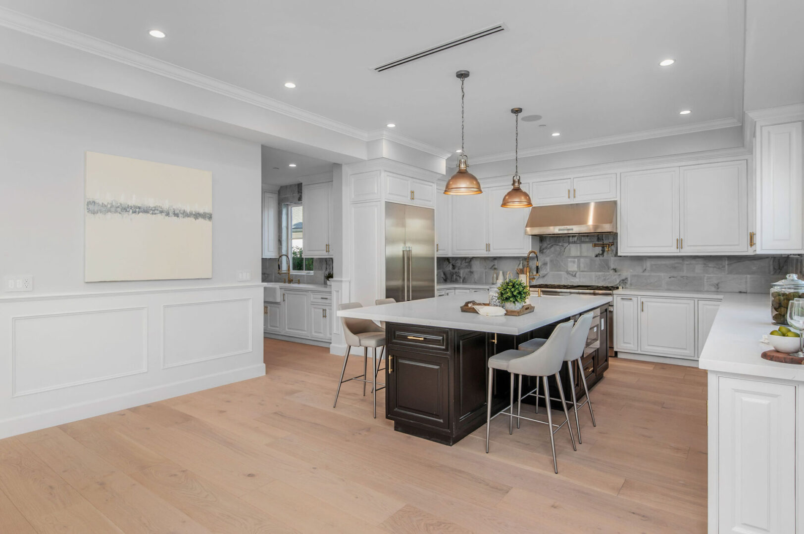 Kitchen With Beautiful Lighting and White Touch